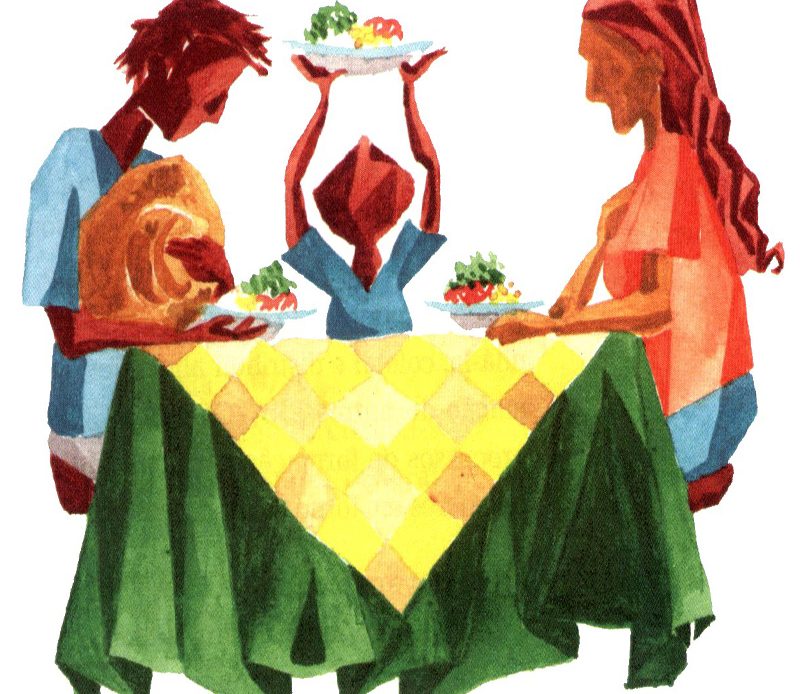 Família na mesa fazendo a refeição